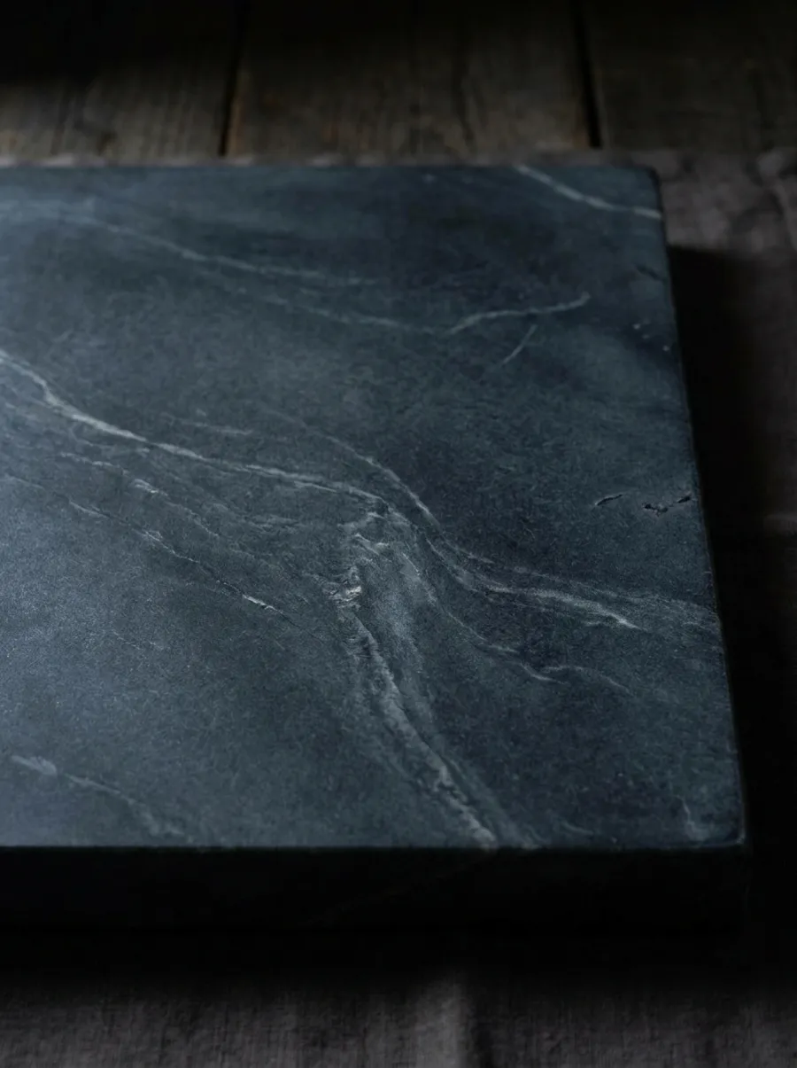 Matte soapstone slab in warm charcoal